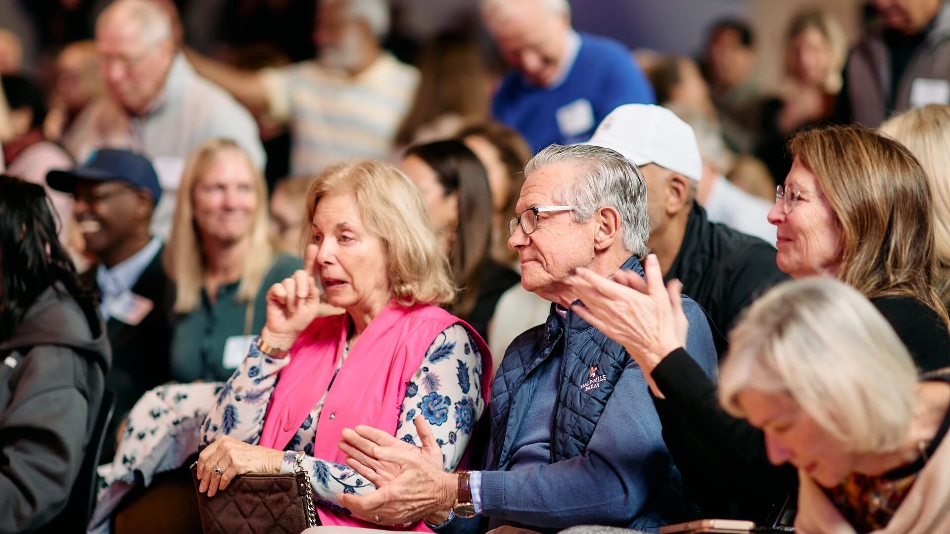 Grandparents clap and weep at student performance
