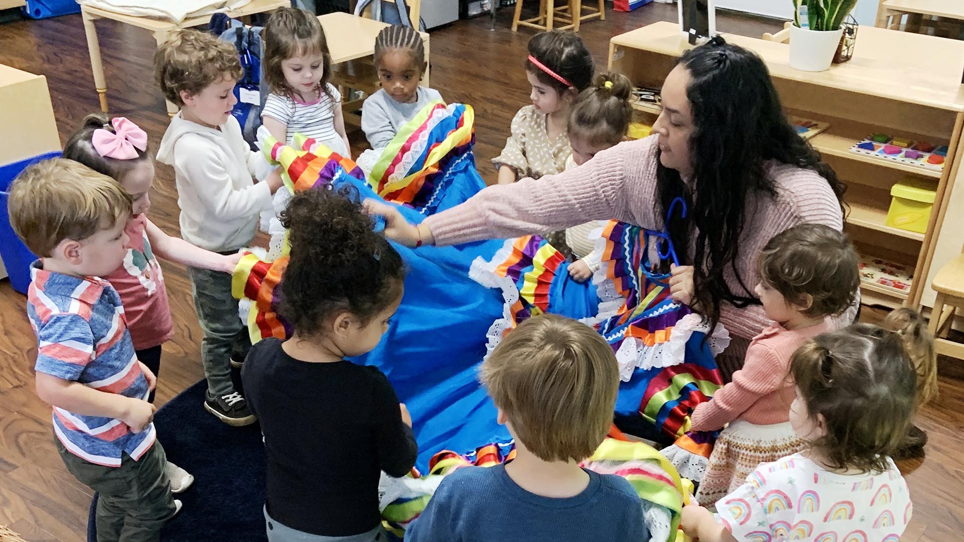 Laura Torres showing her dress with her class