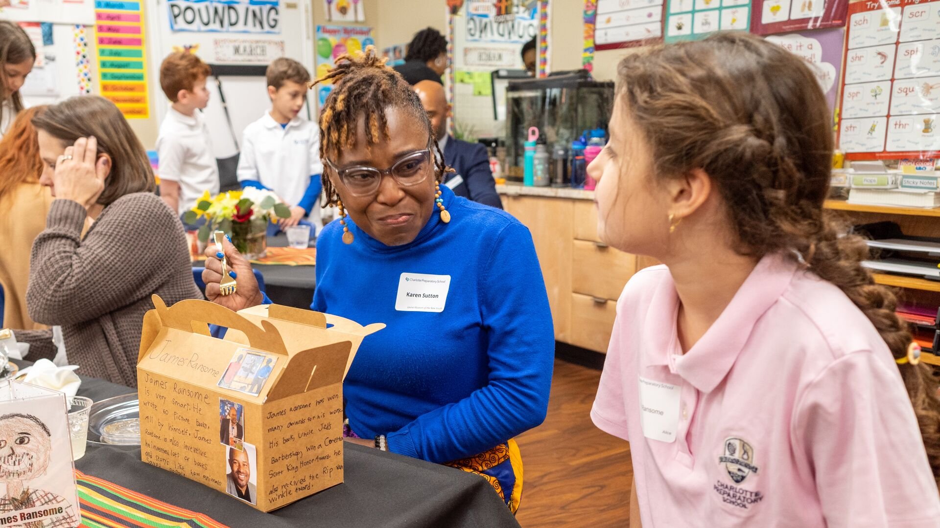 A student talking with a guest